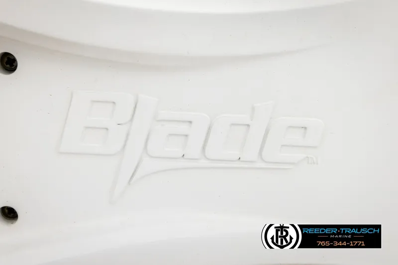 Slide: The Image of Blade logo on 2017 Manitou Oasis SHP boat, Reeder-Trausch Marine branding visible. - 54