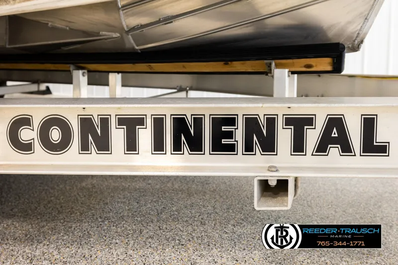 Slide: The Image of 2017 Manitou Oasis SHP on Continental trailer at Reeder-Trausch Marine showroom. - 55