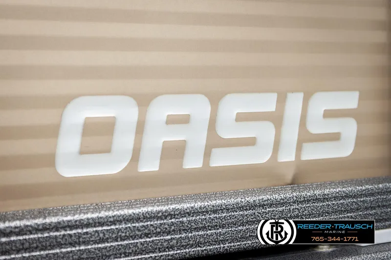 Slide: The Image of 2017 Manitou Oasis SHP logo on a textured background, Reeder-Trausch Marine branding. - 57