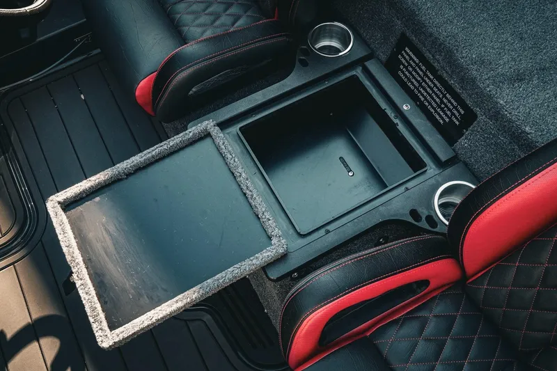 Slide: The Image of Interior of 2026 Phoenix 721 ZXL with storage compartment and cup holders. - 14