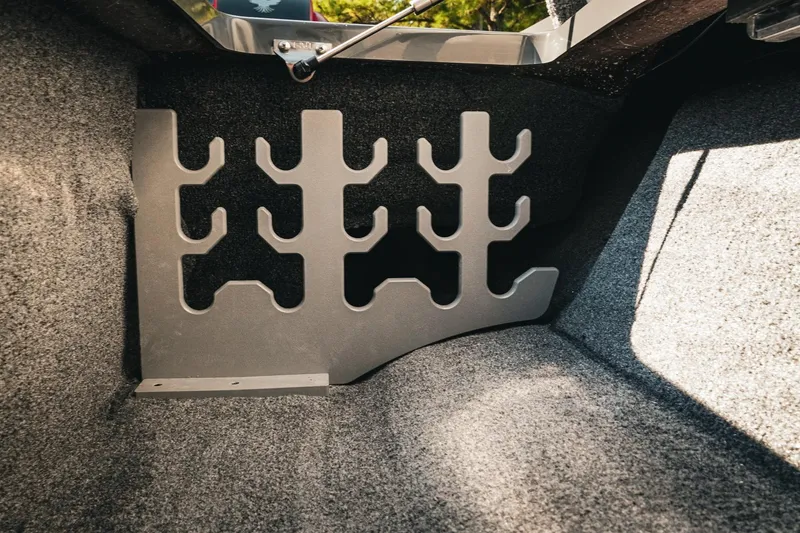 Slide: The Image of Interior of 2026 Phoenix 721 ZXL boat with custom rod holder design. - 24