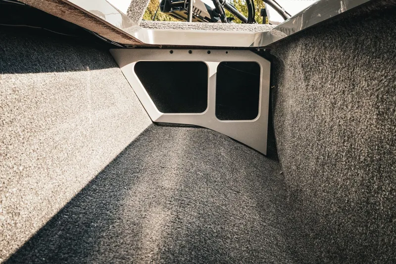 Slide: The Image of Interior view of 2026 Phoenix 721 ZXL boat storage compartment. - 25