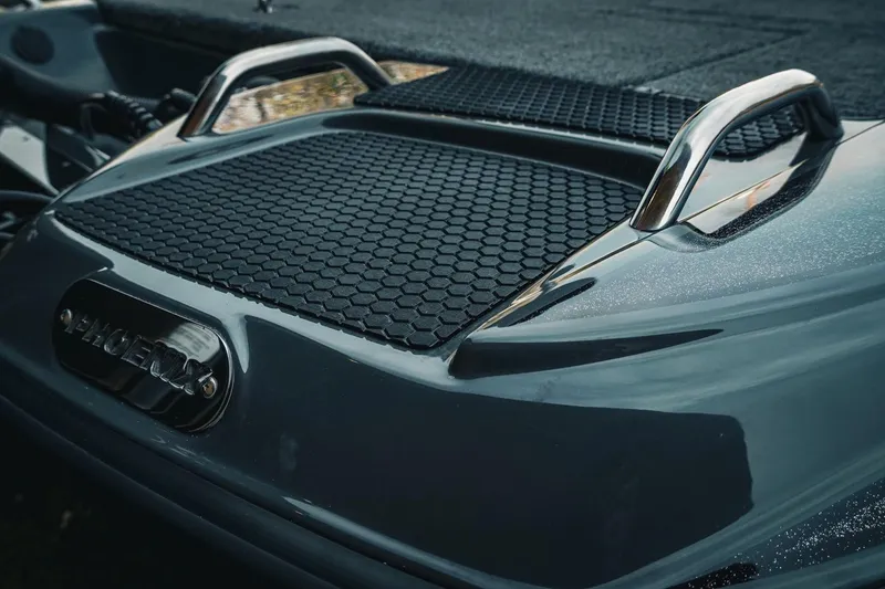 Slide: The Image of 2026 Phoenix 721 ZXL boat with sleek design and textured surface. - 34