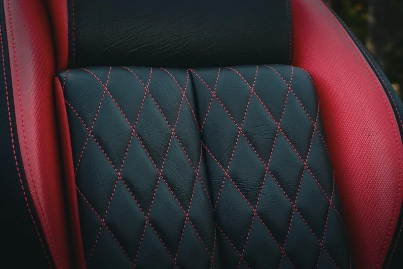 Slide: The Image of Luxurious black and red leather seat with diamond stitching in 2026 Phoenix 721 ZXL. - 38