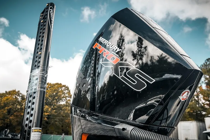 Slide: The Image of Mercury Pro XS engine on 2026 Phoenix 721 ZXL boat, with clear sky reflection. - 10