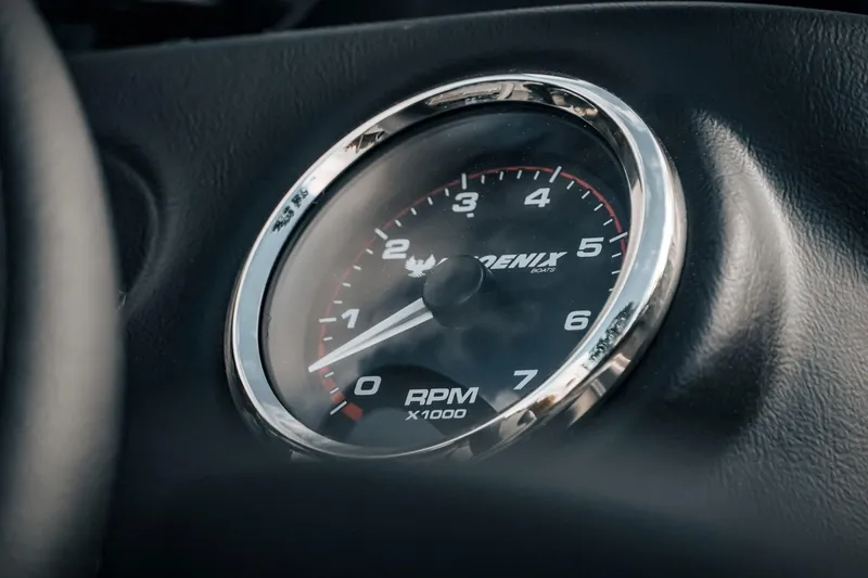 Slide: The Image of Close-up of 2026 Phoenix 721 ZXL tachometer, displaying RPM gauge. - 13