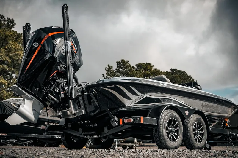 Slide: The Image of 2026 Phoenix 721 ZXL boat on trailer, featuring sleek design and powerful engine. - 25