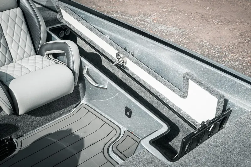 Slide: The Image of Interior of 2026 Phoenix 721 ZXL boat with luxury seating and storage. - 30