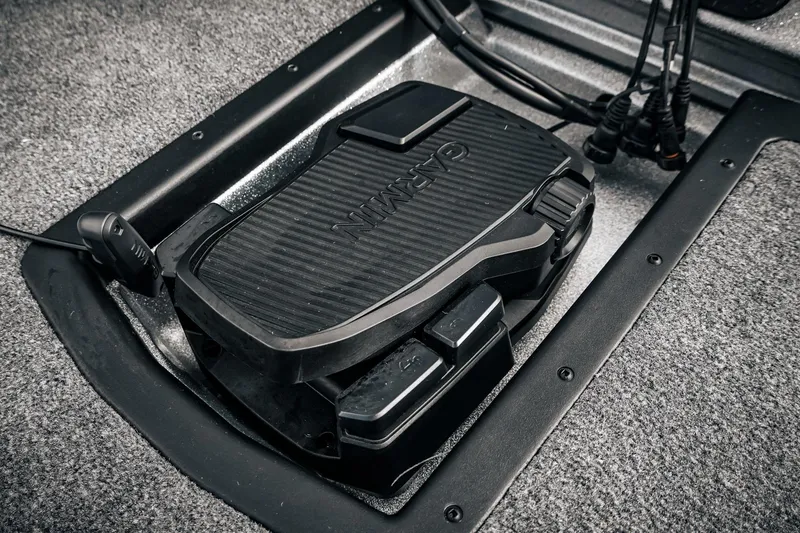 Slide: The Image of Foot pedal control in 2026 Phoenix 721 ZXL boat, featuring Garmin technology. - 36