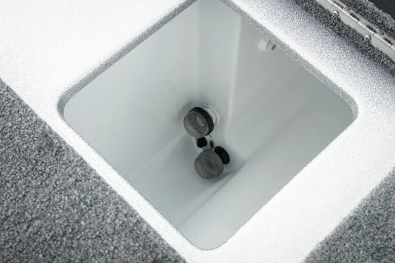 Slide: The Image of Open storage compartment in 2026 Phoenix 721 ZXL boat, featuring a clean interior design. - 39