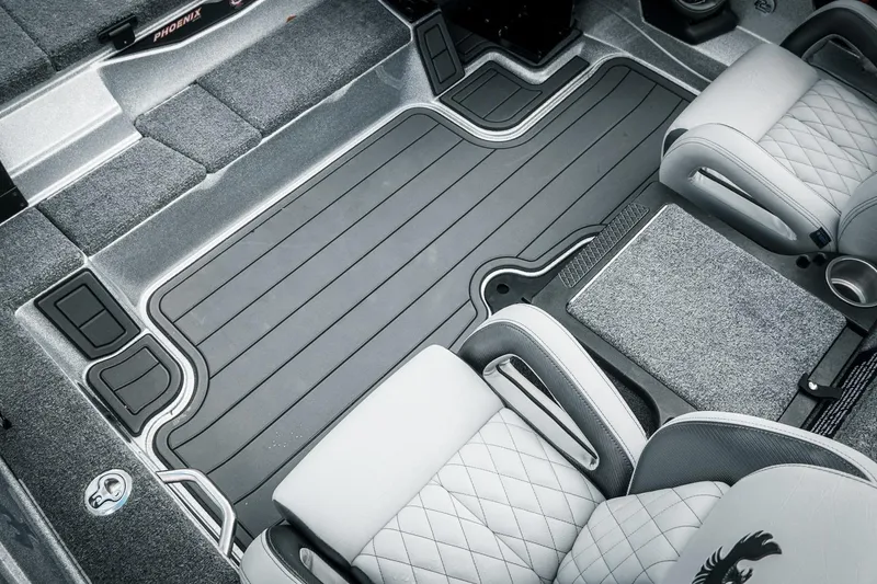Slide: The Image of 2026 Phoenix 721 ZXL boat interior with gray flooring and quilted seats. - 40