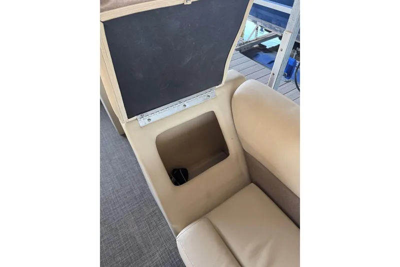 Slide: The Image of 2015 Crest 22 Crest I boat seat with open storage compartment. - 24