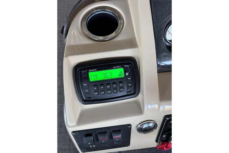 Slide: The Image of Dashboard of 2015 Crest 22 Crest I with radio display and controls. - 27