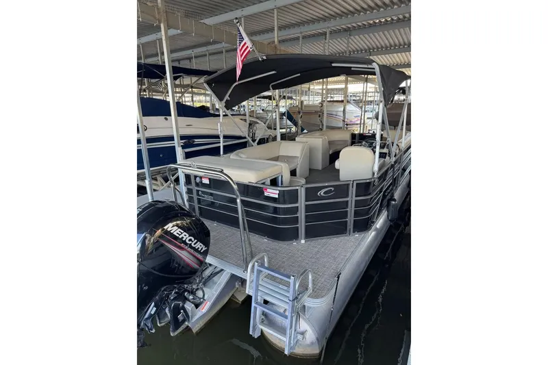 Slide: The Image of 2015 Crest 22 Crest I pontoon boat with canopy and Mercury outboard motor. - 6
