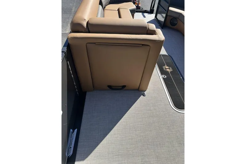 Slide: The Image of 2026 Harris Cruiser 250 LUX interior with tan seating and sleek flooring design. - 5