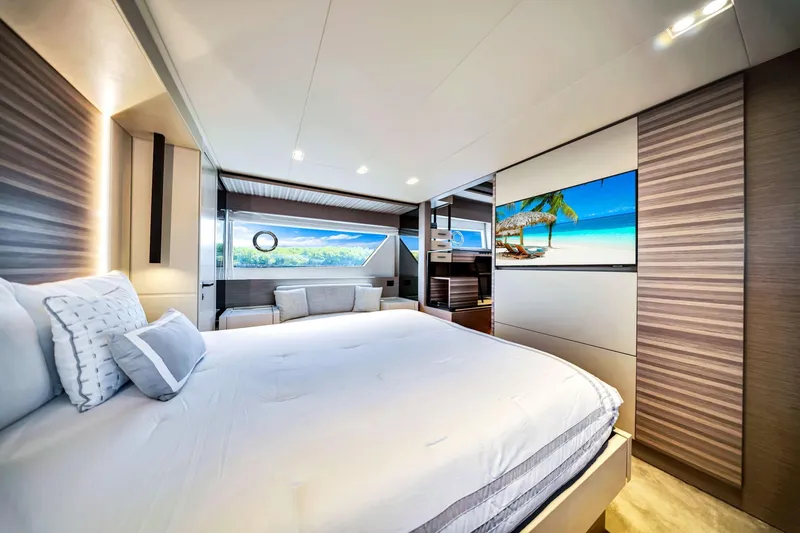Slide: The Image of Luxurious bedroom interior of 2022 Ferretti Yachts 670 with modern design and scenic view. - 45