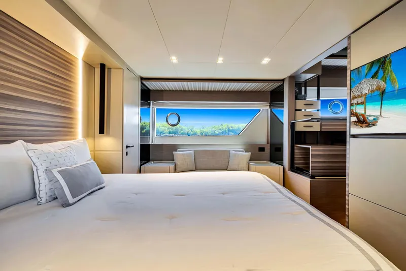 Slide: The Image of Luxurious bedroom interior of 2022 Ferretti Yachts 670 with scenic ocean view. - 42