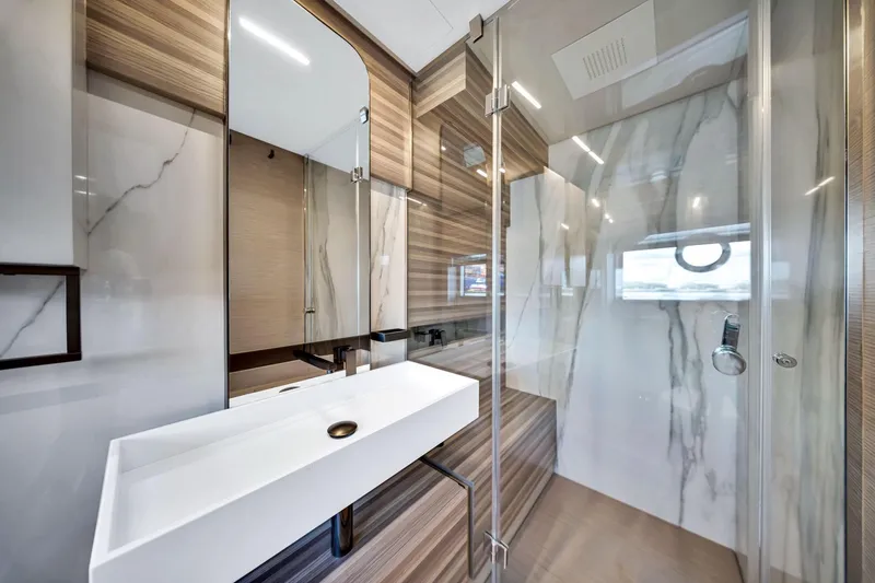 Slide: The Image of Luxurious bathroom in 2022 Ferretti Yachts 670, featuring modern design and elegant finishes. - 46