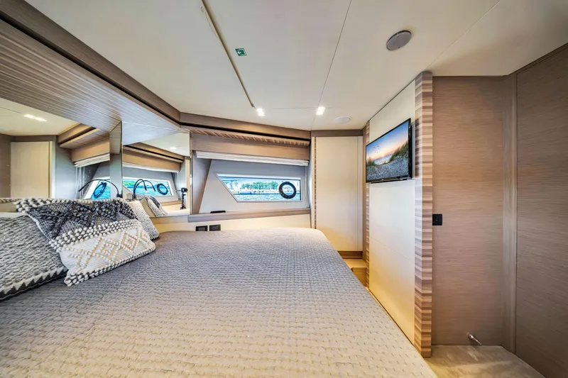 Slide: The Image of Luxurious bedroom interior of 2022 Ferretti Yachts 670, featuring elegant decor and modern amenities. - 51
