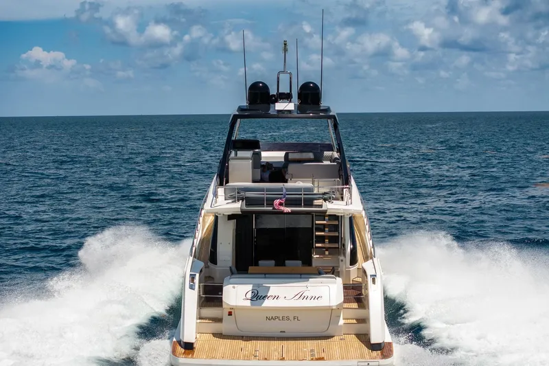 Slide: The Image of 2022 Ferretti Yachts 670 cruising on open sea under blue sky. - 71