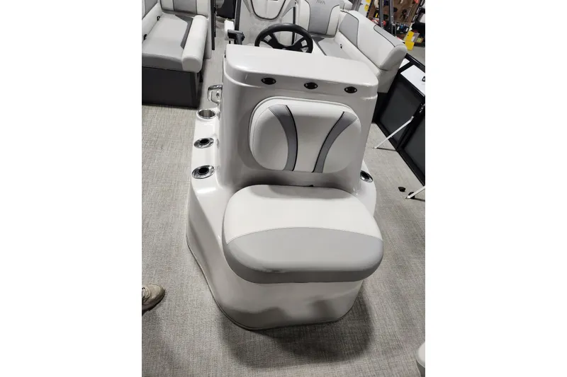 Slide: The Image of 2026 Avalon Venture 85 Center Console Fish boat interior with seating and steering console. - 5