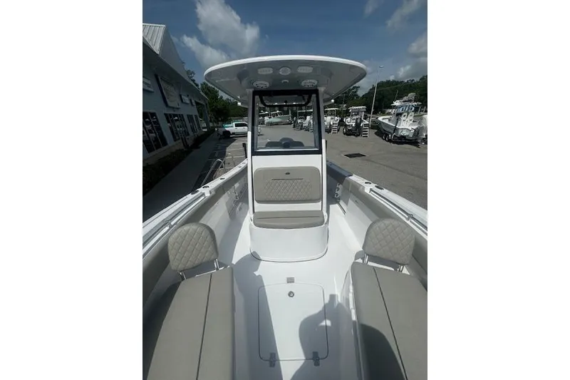 Slide: The Image of 2025 Sportsman Open 232 Center Console boat with spacious seating and modern design. - 3