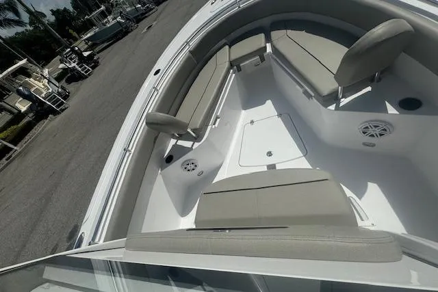 Slide: The Image of 2025 Sportsman Open 232 Center Console boat with spacious seating and modern design. - 4