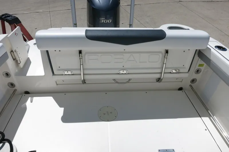Slide: The Image of 2021 Robalo R247 Dual Console boat interior with Yamaha 300 engine. - 20