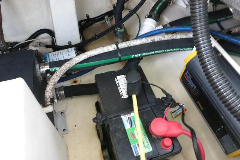Slide: The Image of 2021 Robalo R247 Dual Console boat battery and wiring setup. - 24