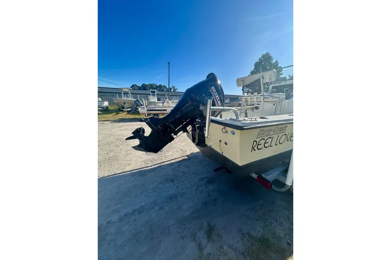 Slide: The Image of 2017 May-Craft 1800CC boat with Suzuki outboard motor in a sunny outdoor setting. - 7