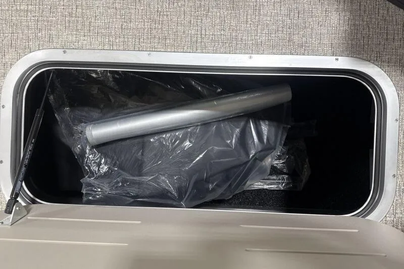 Slide: The Image of 2026 Bennington 26 MFBSF boat dashboard with modern steering wheel and digital displays. - 14