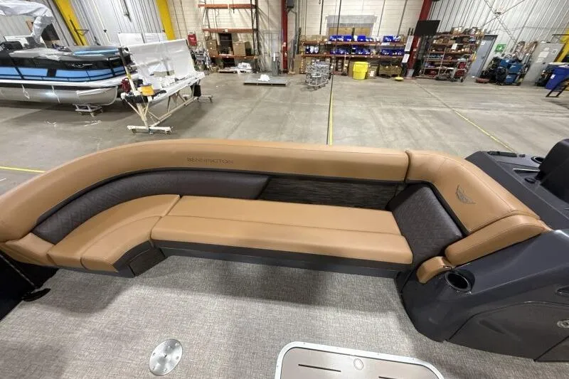 Slide: The Image of 2026 Bennington 26 MFBSF boat interior with luxurious captain's chair and modern dashboard. - 17