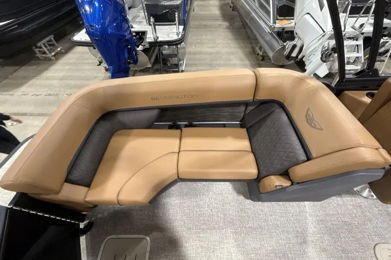 Slide: The Image of 2026 Bennington 26 MFBSF boat interior with luxurious captain's chair and modern dashboard. - 19