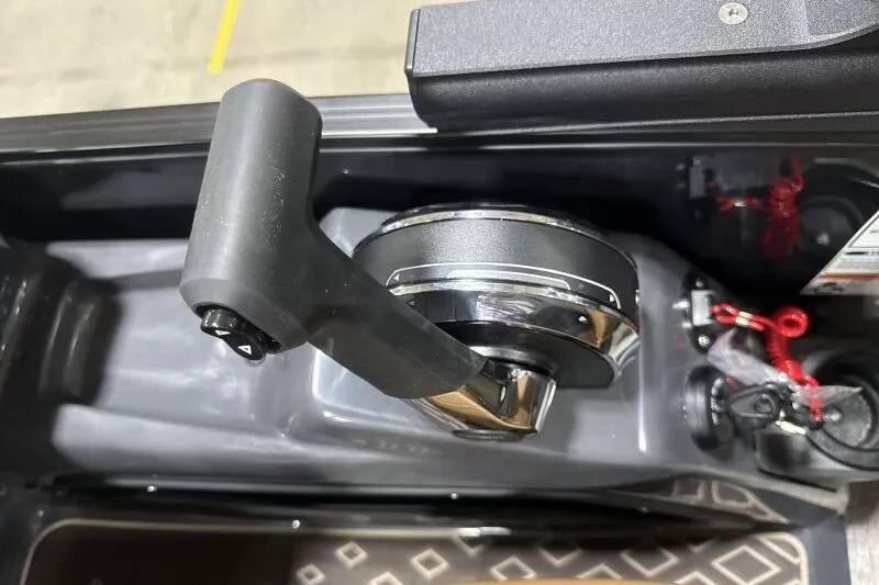 Slide: The Image of 2026 Bennington 26 MFBSF boat interior with tan seating and purple LED lighting. - 21