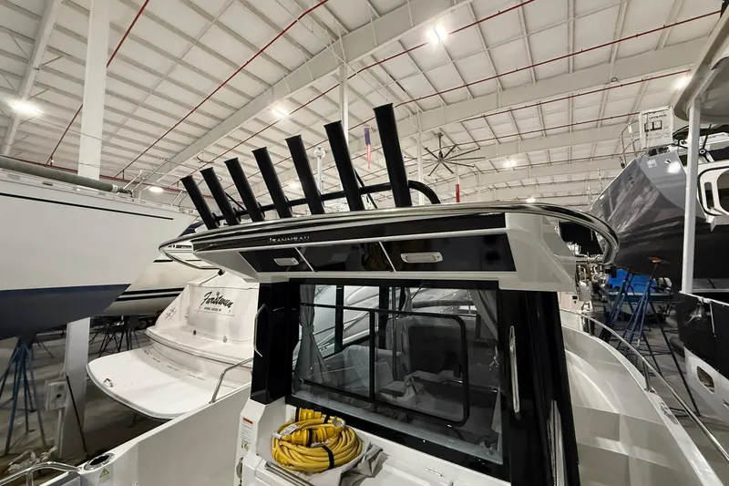 Slide: The Image of 2024 Jeanneau NC Sport 795 Series 2 boat in indoor storage facility. - 14