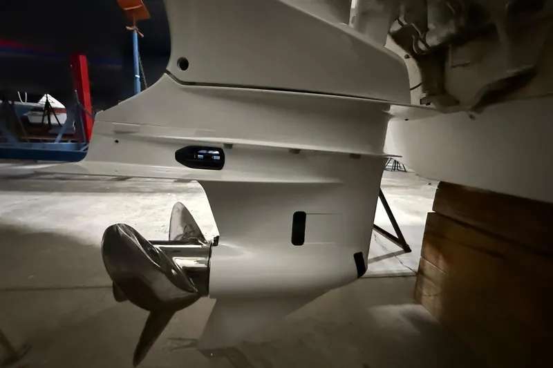 Slide: The Image of 2024 Jeanneau NC Sport 795 Series 2 boat propeller and lower unit detail. - 3