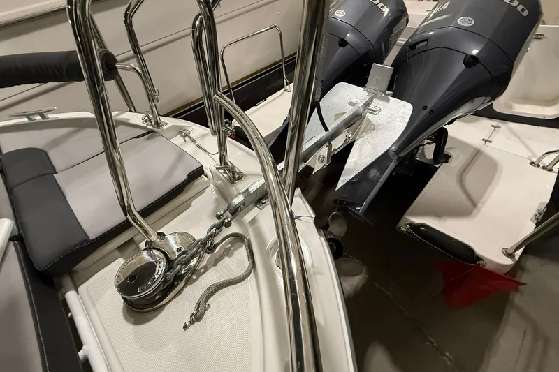 Slide: The Image of 2024 Jeanneau NC Sport 795 Series 2 boat with dual outboard motors and anchor system. - 16