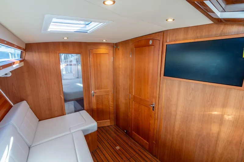 Slide: The Image of Luxurious interior of 2025 MJM 42 yacht with wood paneling and modern amenities. - 28