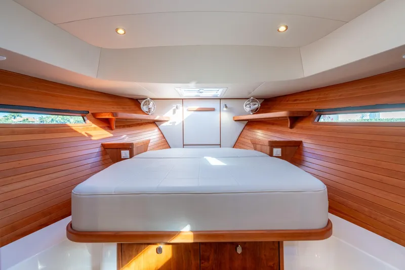 Slide: The Image of Luxurious cabin interior of 2025 MJM 42 yacht with wooden paneling and modern lighting. - 32