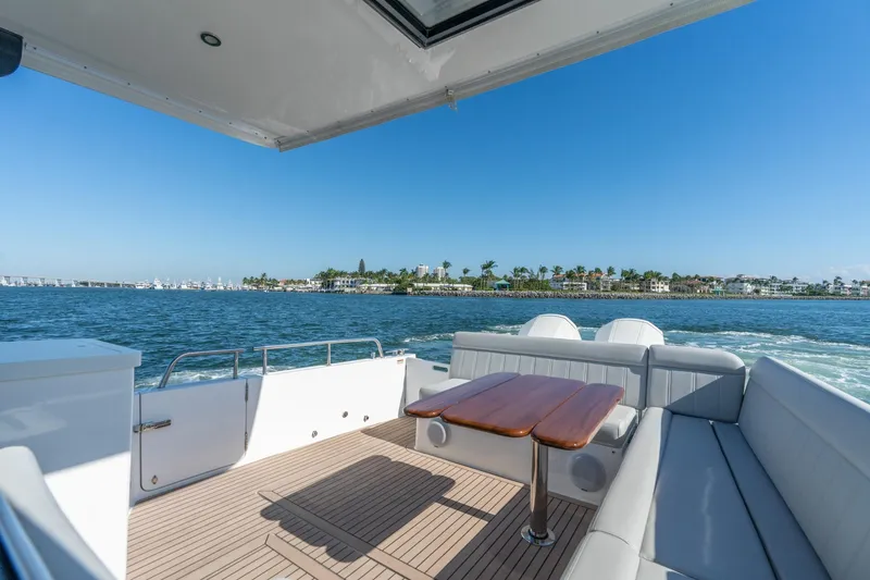 Slide: The Image of Luxurious MJM 42 yacht interior with scenic ocean view, 2025 model. - 34