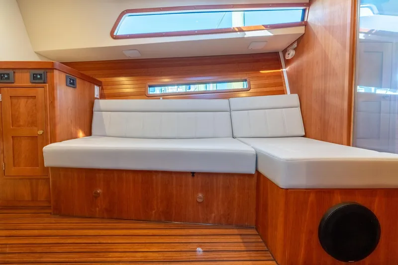 Slide: The Image of Luxurious interior of 2025 MJM 42 yacht with elegant wood finish and comfortable seating. - 36