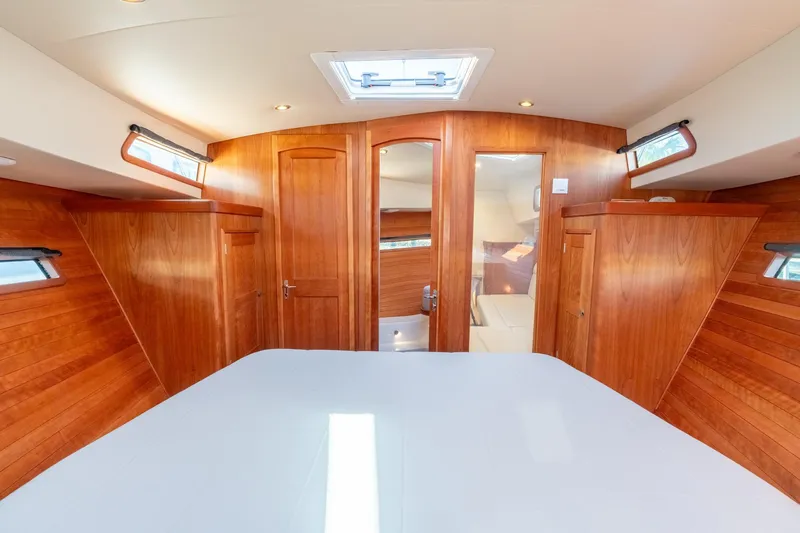 Slide: The Image of Luxurious 2025 MJM 42 yacht interior with elegant wood paneling and modern design. - 5