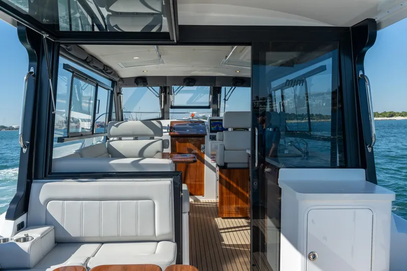 Slide: The Image of Interior view of 2025 MJM 42 yacht, featuring luxurious seating and modern design. - 6