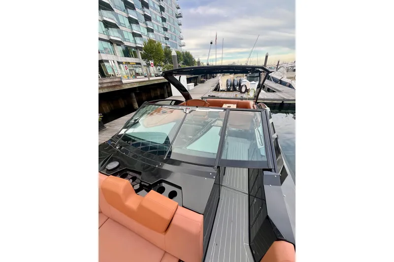 Slide: The Image of 2022 Cruisers Yachts 338 South Beach Edition Bow Rider docked at marina. - 21