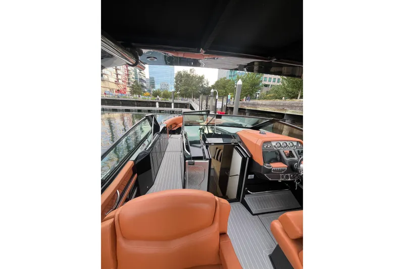 Slide: The Image of 2022 Cruisers Yachts 338 South Beach Edition Bow Rider interior with luxurious seating. - 23