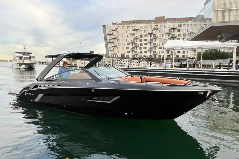 Slide: The Image of 2022 Cruisers Yachts 338 South Beach Edition Bow Rider in marina setting. - 10