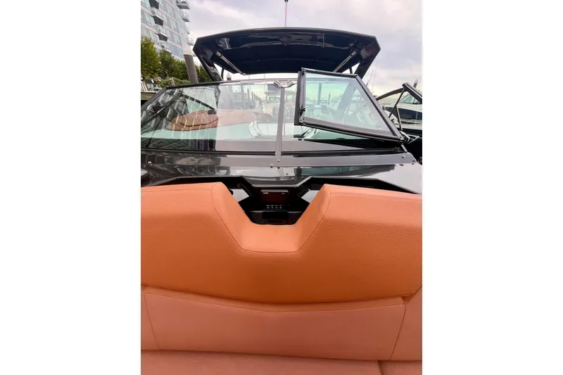 Slide: The Image of 2022 Cruisers Yachts 338 South Beach Edition Bow Rider with tan seating and sleek design. - 20