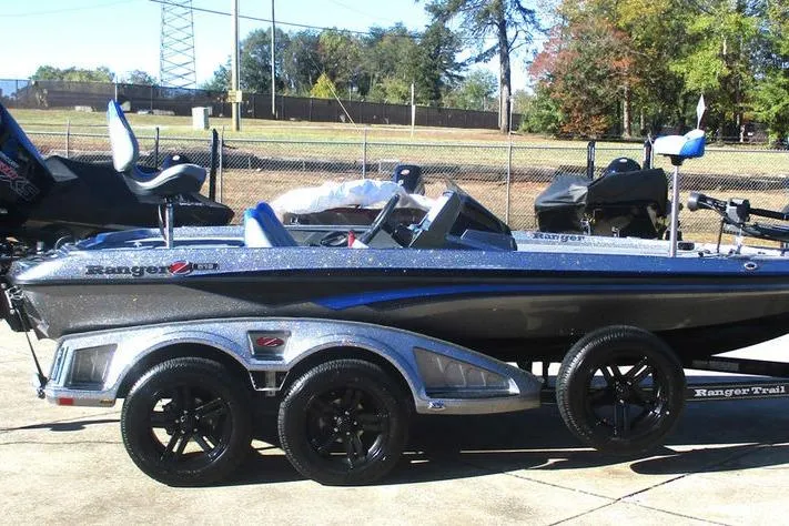 Slide: The Image of 2026 Ranger Z519 Ranger Cup Equipped boat on trailer, parked outdoors. - 5
