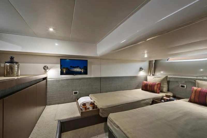 Slide: The Image of Manufacturer Provided Image: Luxurious cabin interior of 2016 Sea Ray 400 Fly yacht with twin beds and TV. - 12