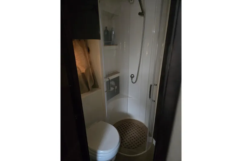Slide: The Image of Compact bathroom in 2016 Sea Ray 400 Fly yacht with shower and toilet. - 15